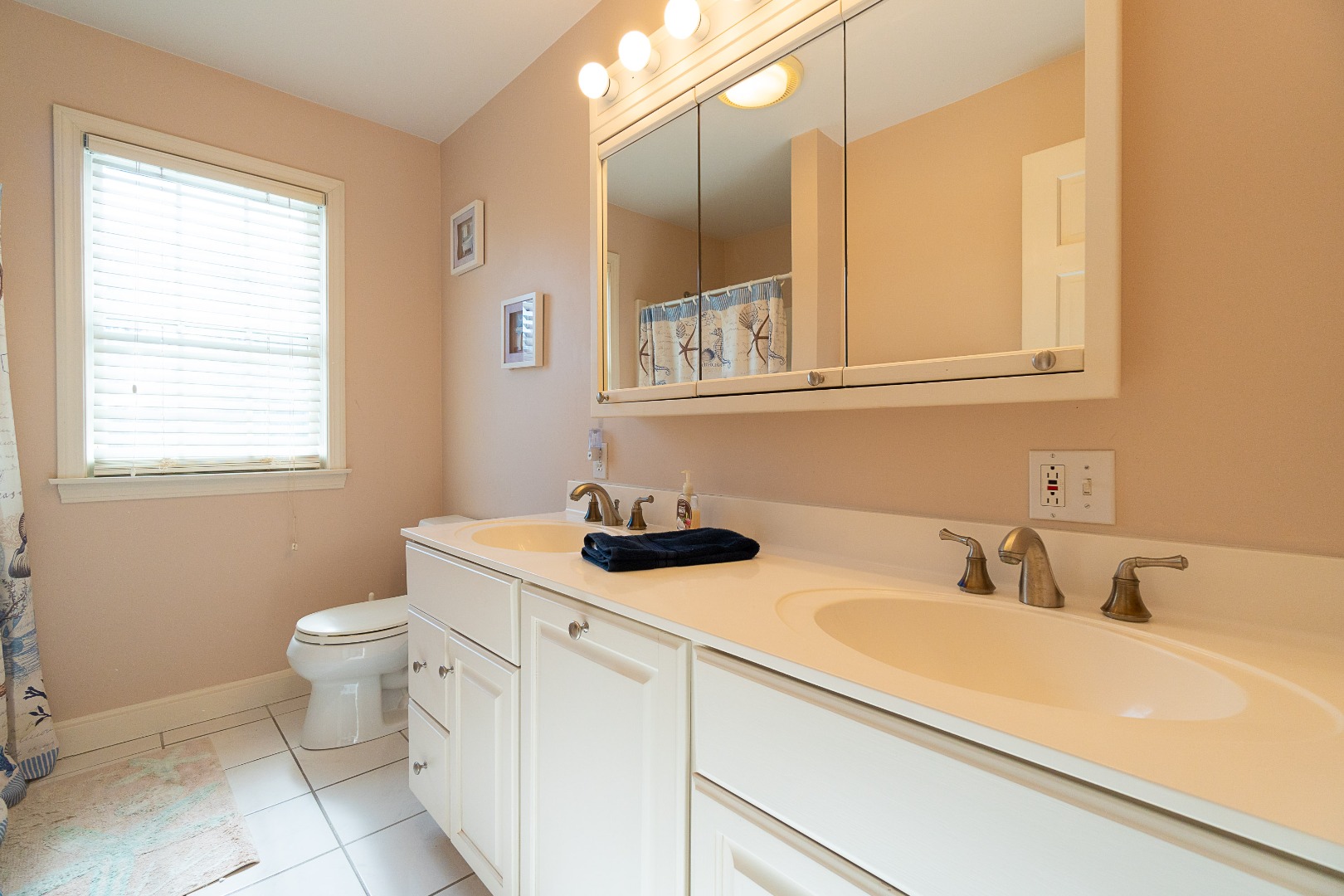 35 Pine Crest Drive Nantucket, MA 02554 - Photo 27 of 44 a bathroom with a sink and a toilet