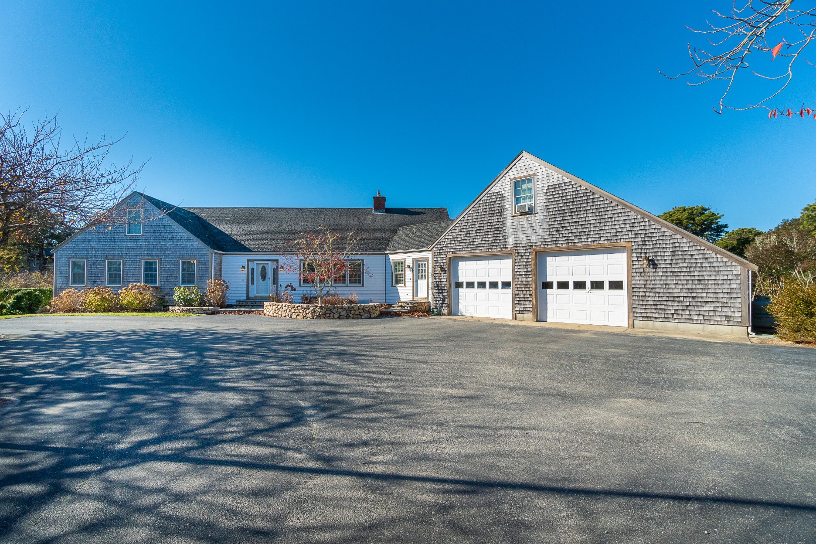 35 Pine Crest Drive Nantucket, MA 02554 - Photo 3 of 44 a front view of a house with a yard