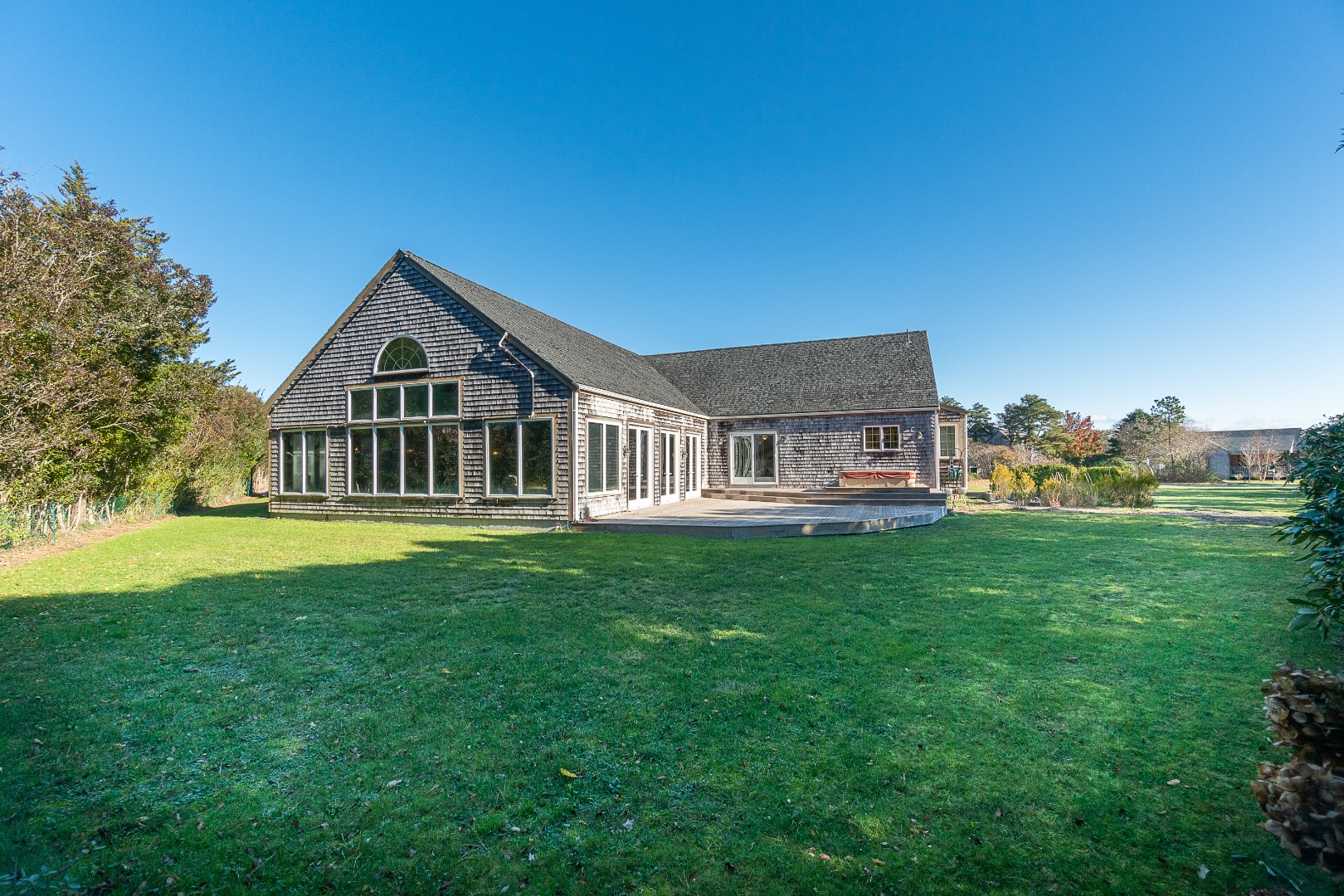 35 Pine Crest Drive Nantucket, MA 02554 - Photo 38 of 44 a front view of a house with garden