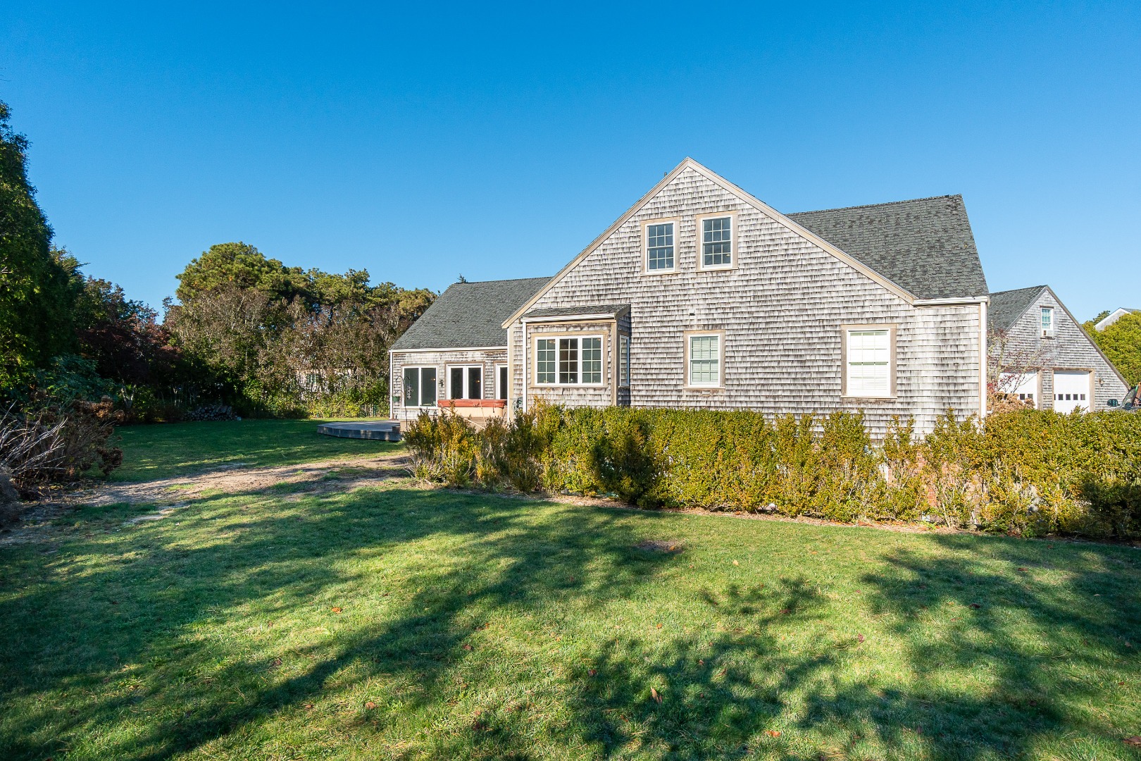 35 Pine Crest Drive Nantucket, MA 02554 - Photo 5 of 44 a front view of house with yard and green space