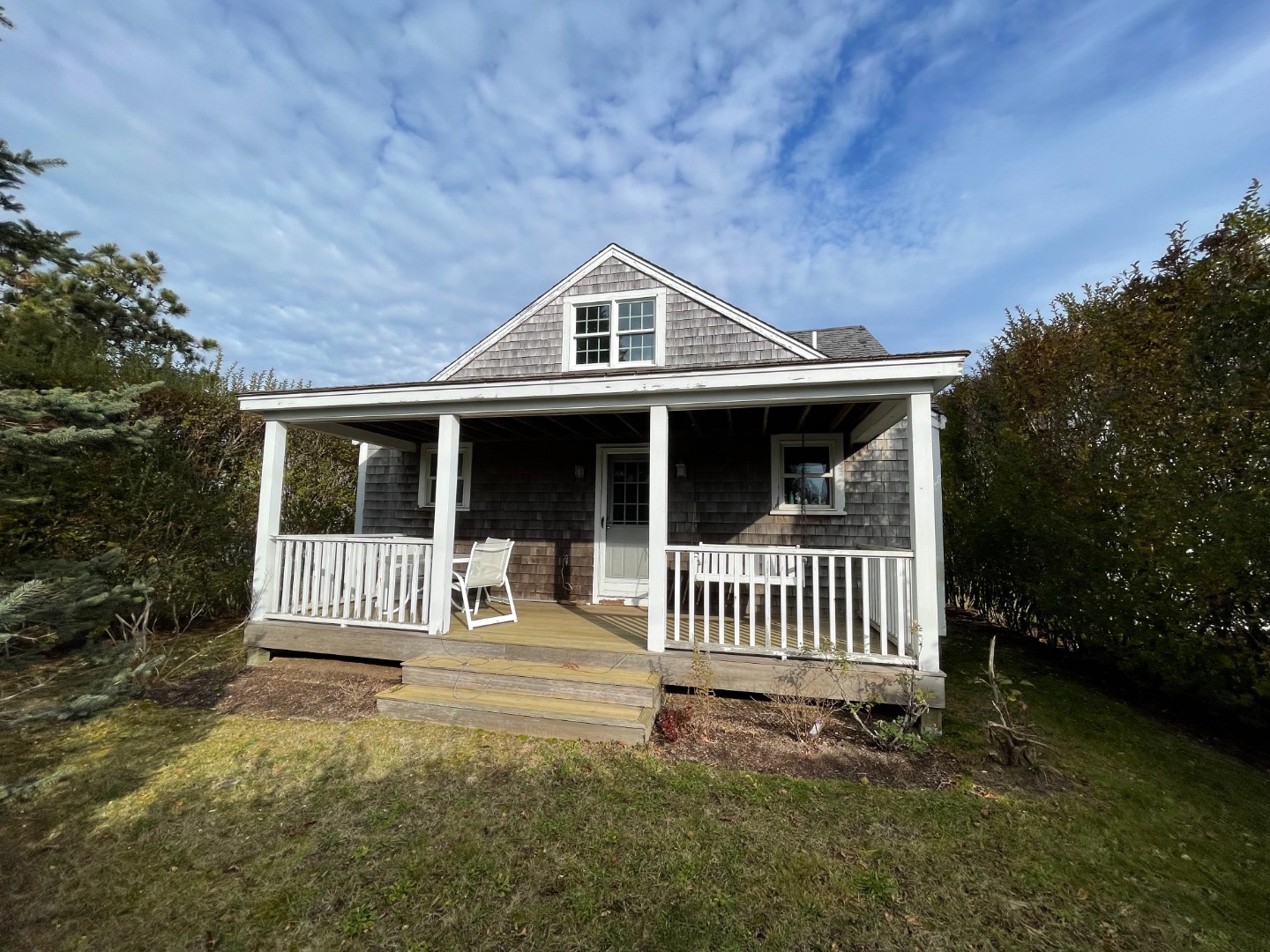 35 Pine Crest Drive Nantucket, MA 02554 - Photo 6 of 44 a front view of a house with garden