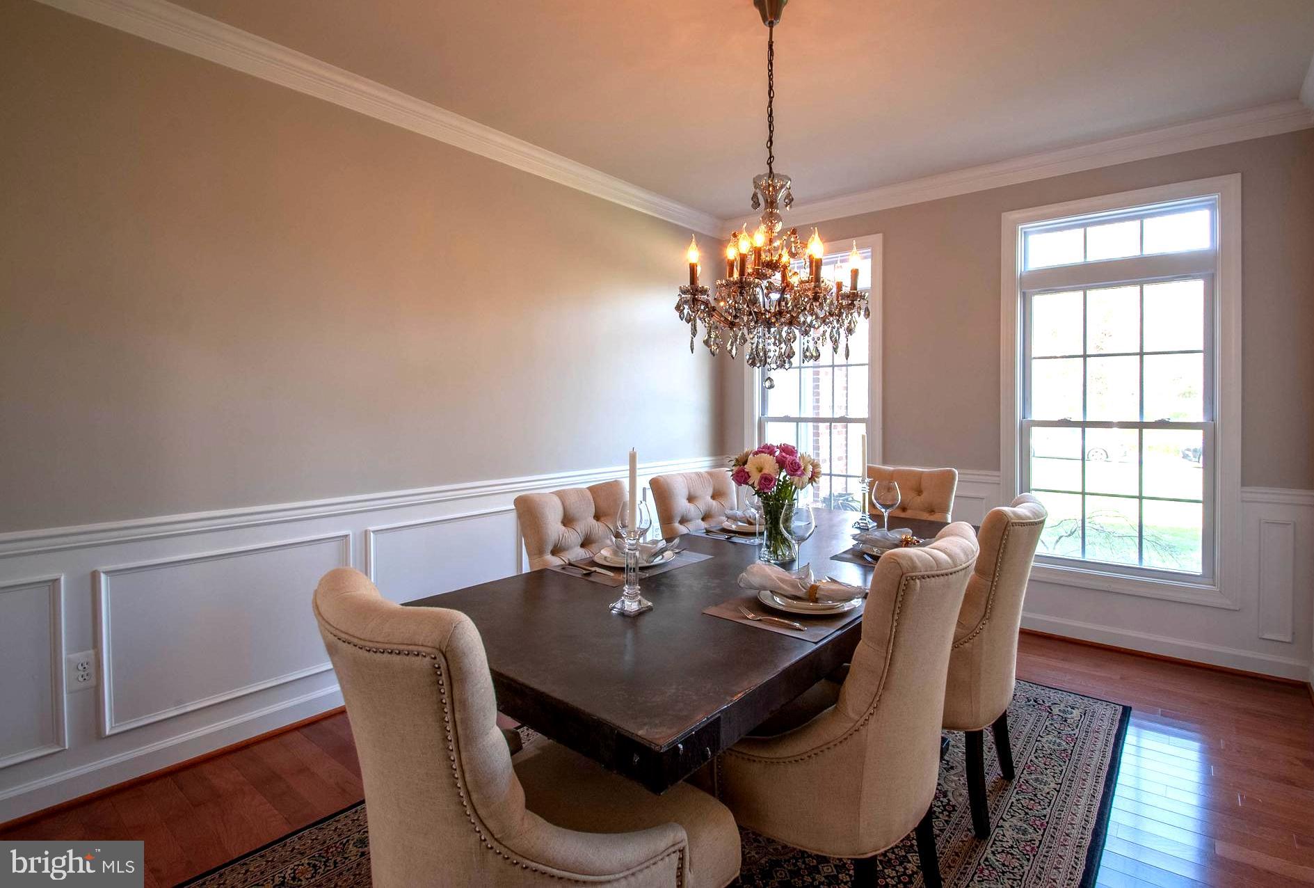 1490 Shot Town Road Annapolis, MD 21409 - Photo 8 of 40 Chandeliered Formal Dining Room w/ Wainscoting