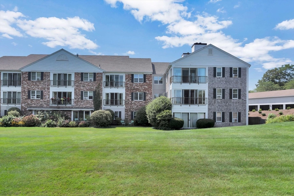 78 Highview Drive, Unit 78 Sandwich, MA 02563 - Photo 2 of 20 a view of a house with a yard