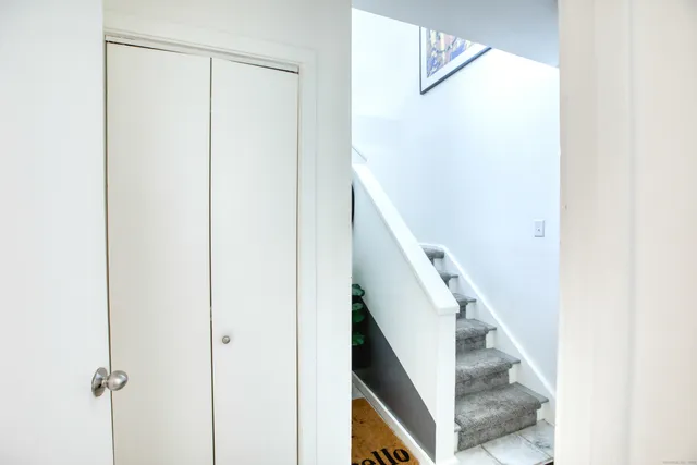 a view of a hallway with staircase