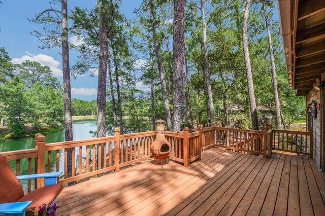 a view of a wooden chairs on deck
