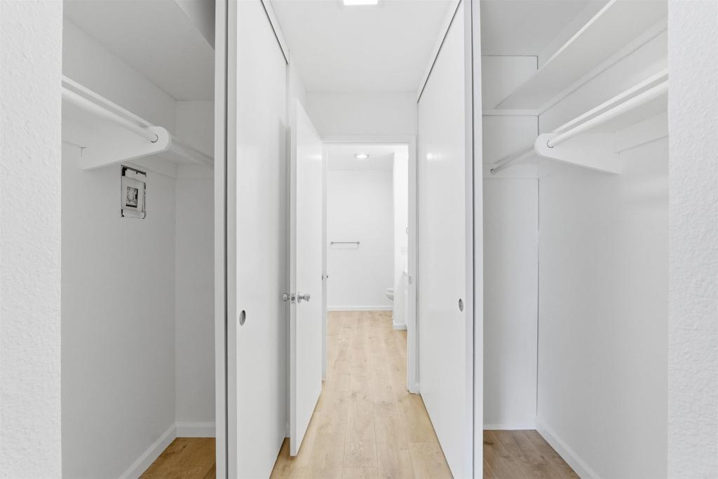 17607 Pomerado Road, Unit 107 San Diego, CA 92128 - Photo 13 of 26 a view of a bathroom from a hallway
