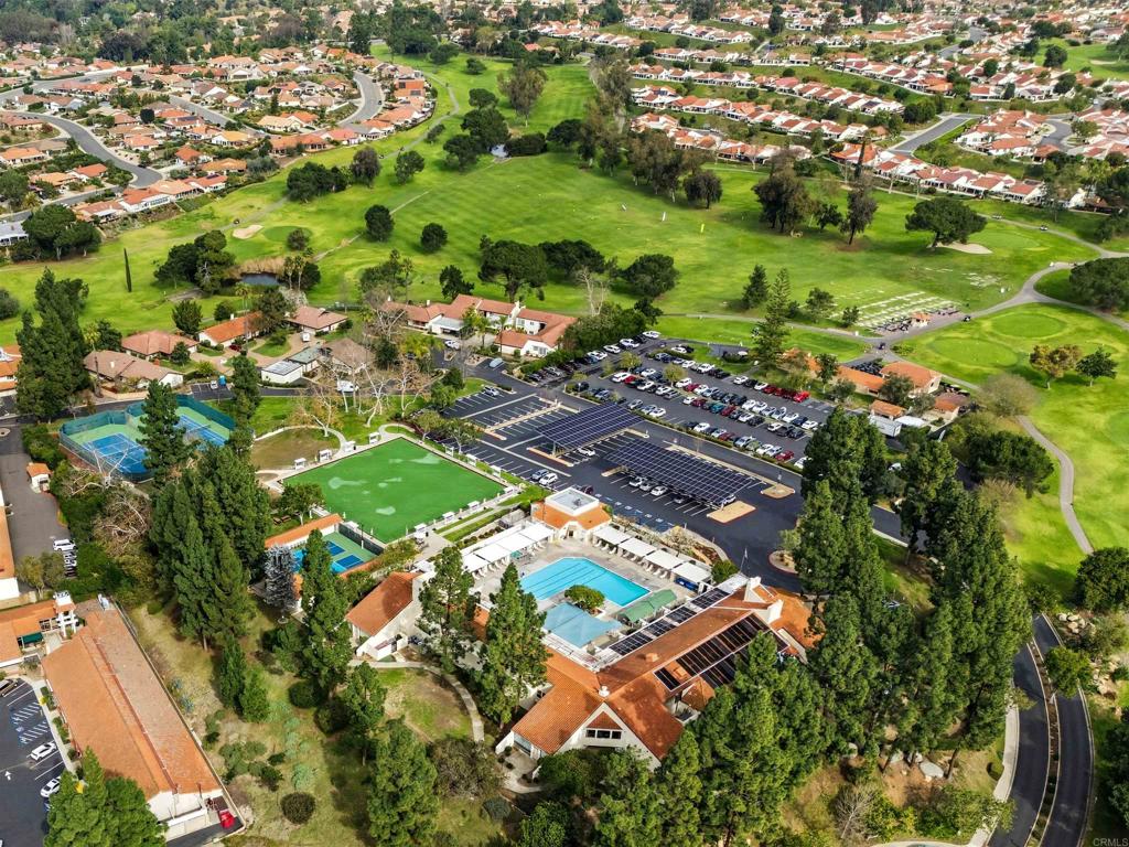17607 Pomerado Road, Unit 107 San Diego, CA 92128 - Photo 2 of 26 an aerial view of residential houses with outdoor space
