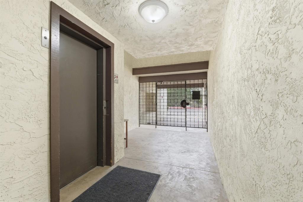 17607 Pomerado Road, Unit 107 San Diego, CA 92128 - Photo 21 of 26 a view of a hallway