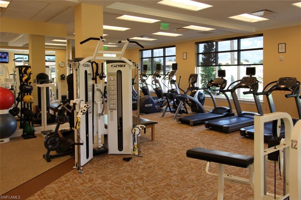 4873 Hampshire Court, Unit 104 Naples, FL 34112 - Photo 34 of 43 a view of a room with gym equipment