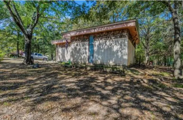 a view of a small barn