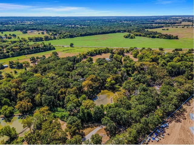 a view of a city with a lake