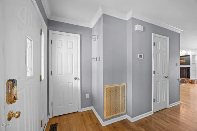 a kitchen with stainless steel appliances granite countertop a refrigerator a stove top oven a sink and dishwasher