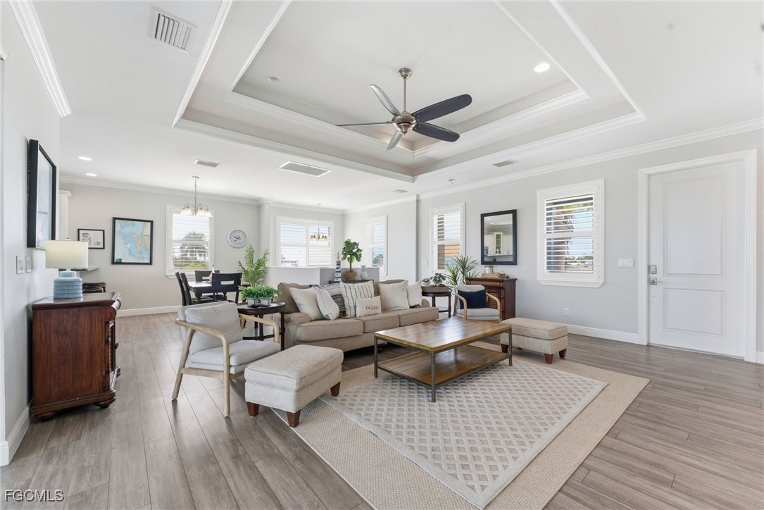 12304 Boat Shell Drive Matlacha Isles, FL 33991 - Photo 11 of 47 a living room with furniture and a wooden floor