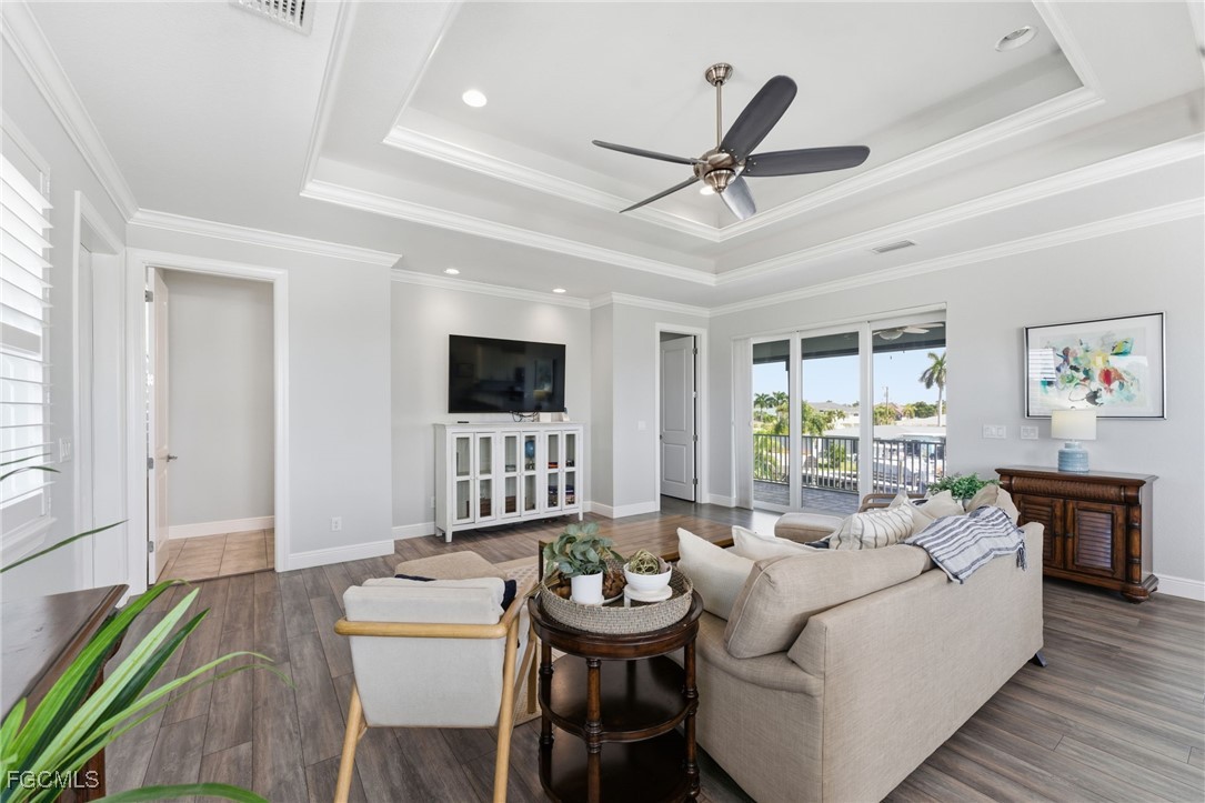 12304 Boat Shell Drive Matlacha Isles, FL 33991 - Photo 12 of 47 a living room with furniture and a large window