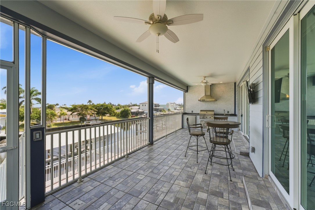 12304 Boat Shell Drive Matlacha Isles, FL 33991 - Photo 29 of 47 a view of a dining room with furniture window and outside view