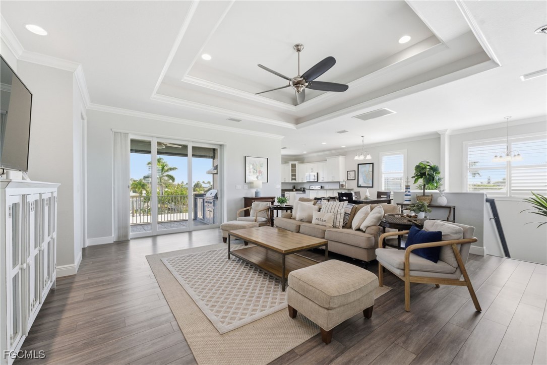 12304 Boat Shell Drive Matlacha Isles, FL 33991 - Photo 8 of 47 a living room with furniture and a large window