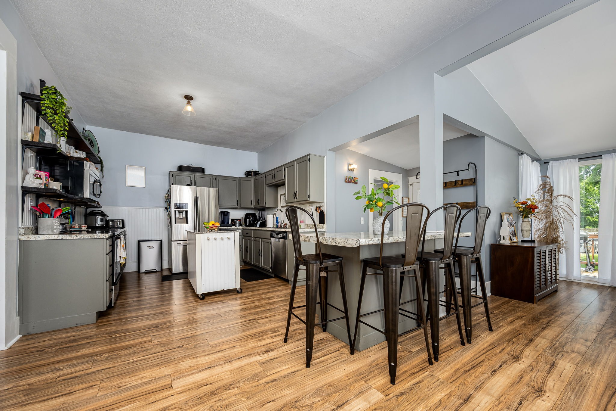 634 Highway 52 Portland, TN 37148 - Photo 16 of 42 a view of a dining room with furniture and wooden floor