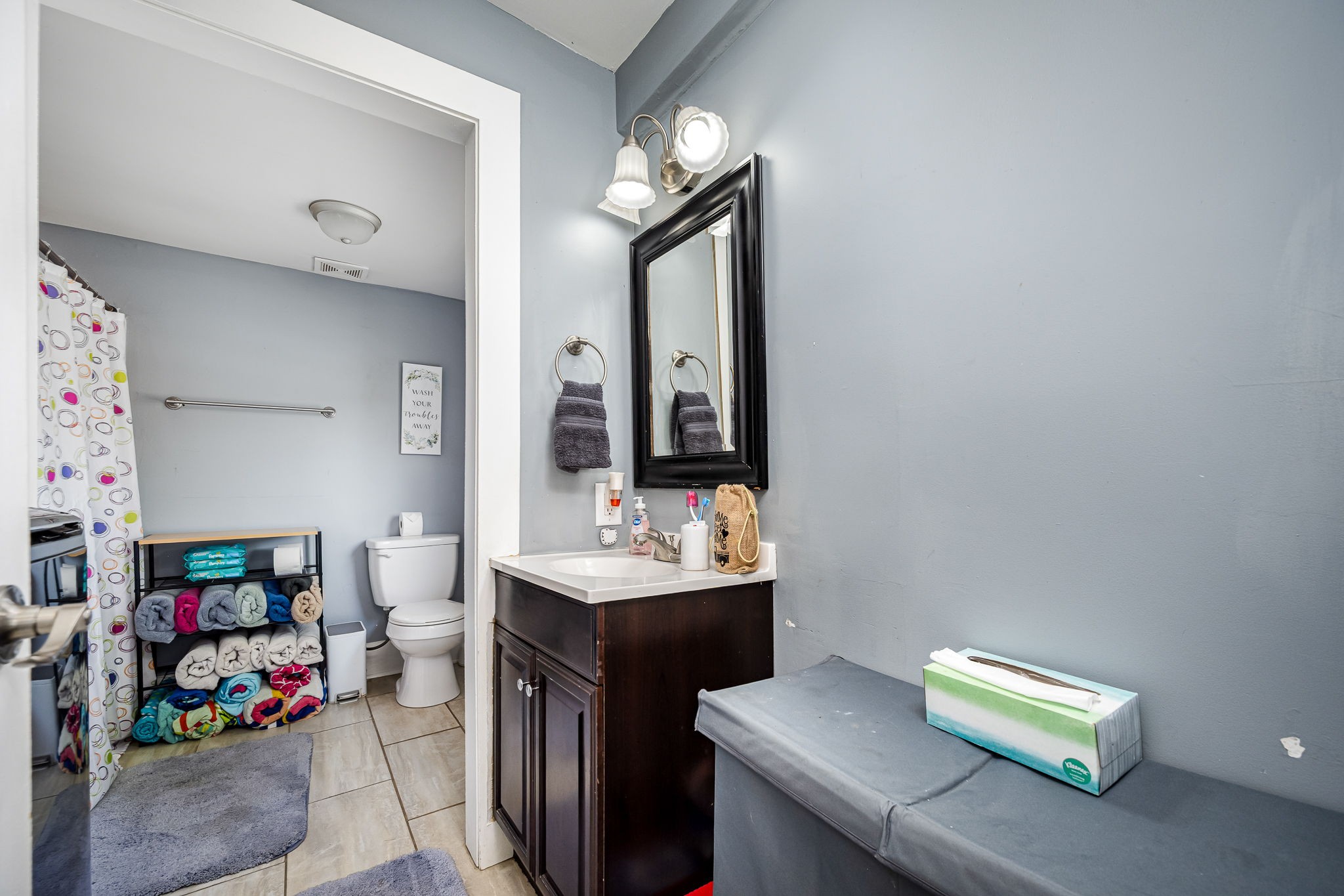 634 Highway 52 Portland, TN 37148 - Photo 22 of 42 a bathroom with a sink vanity and a mirror