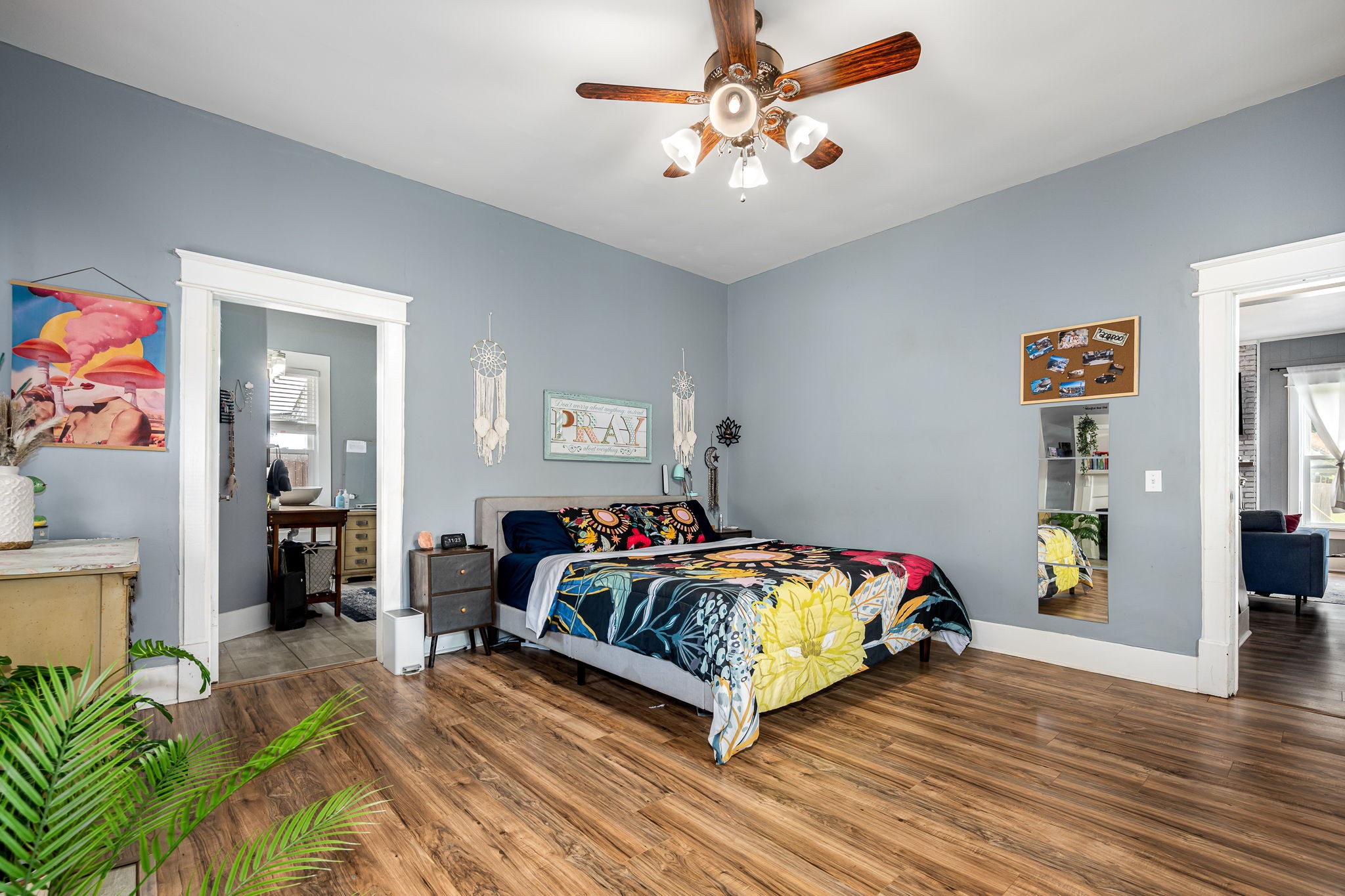 634 Highway 52 Portland, TN 37148 - Photo 24 of 42 a bedroom with a bed and wooden floor