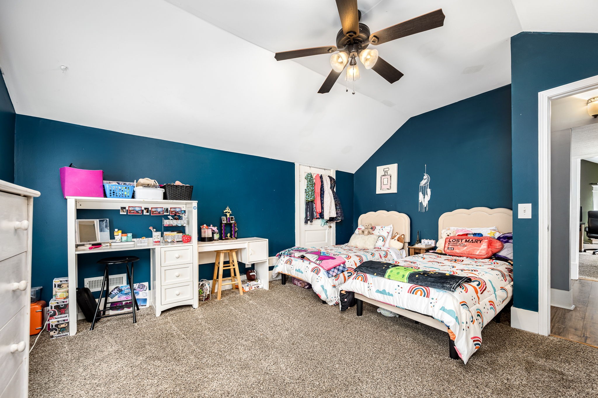 634 Highway 52 Portland, TN 37148 - Photo 29 of 42 a bedroom with bed and a chandelier