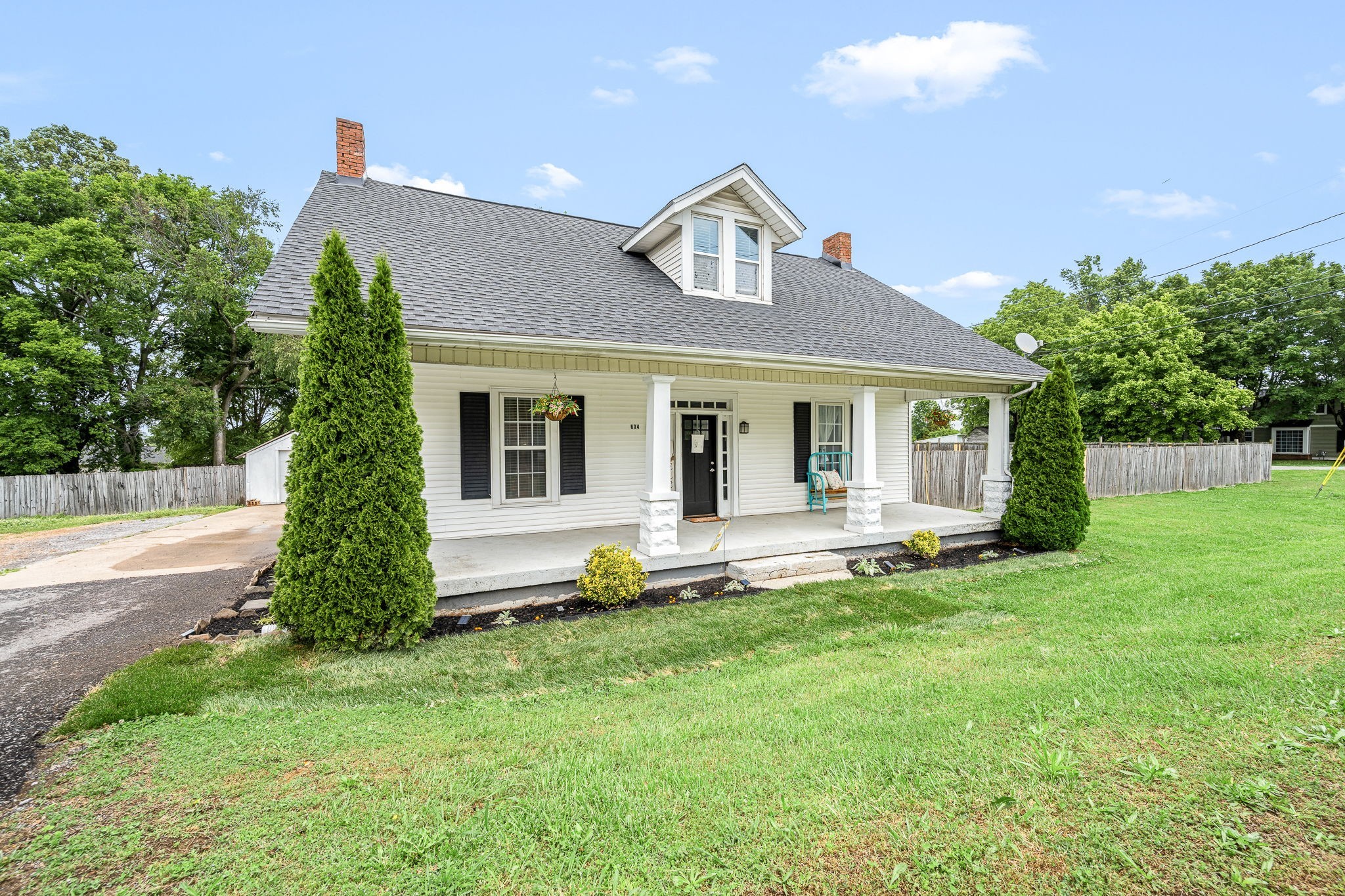 634 Highway 52 Portland, TN 37148 - Photo 3 of 42 a front view of a house with a yard