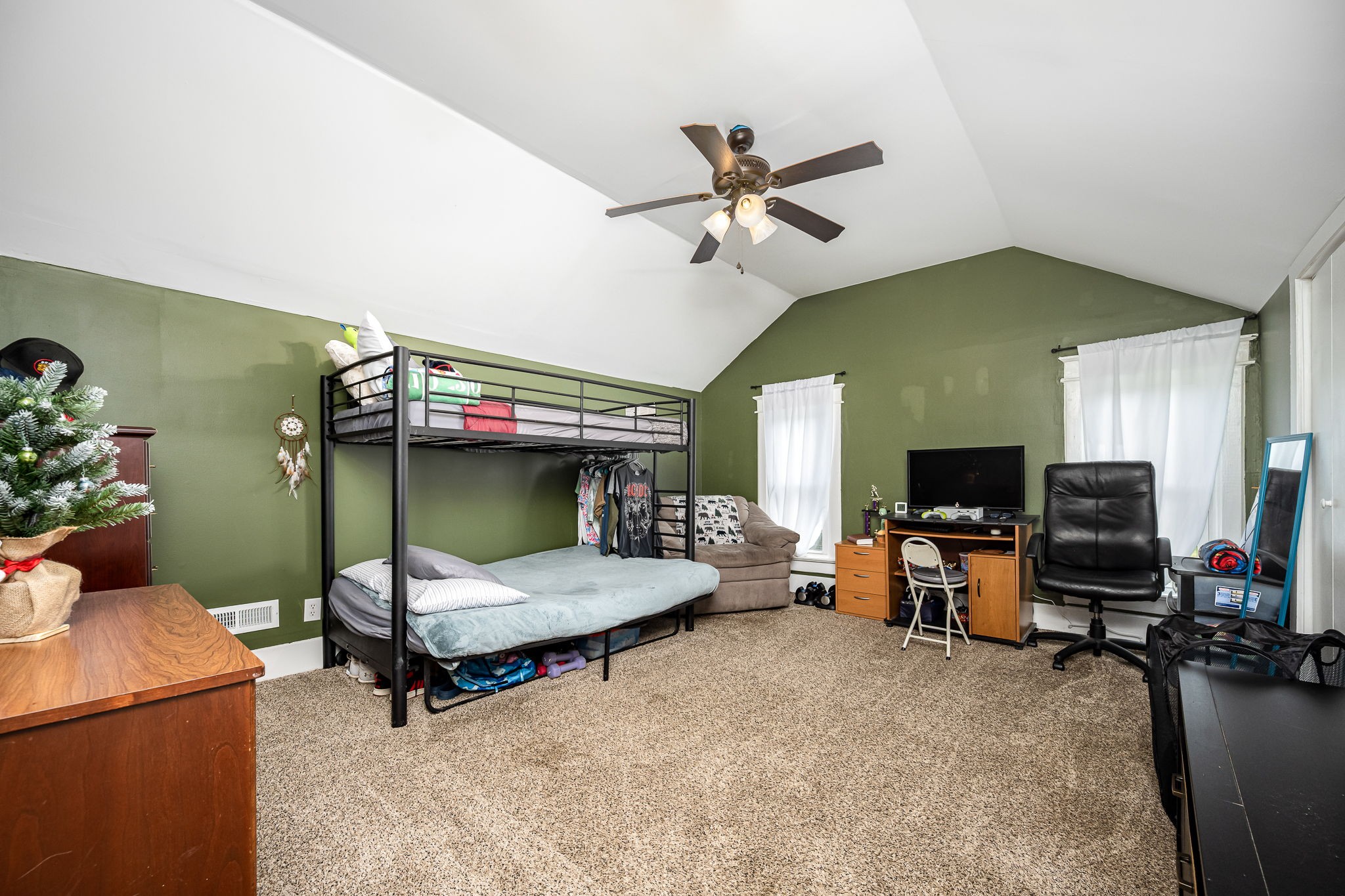 634 Highway 52 Portland, TN 37148 - Photo 31 of 42 a living room with furniture and a flat screen tv