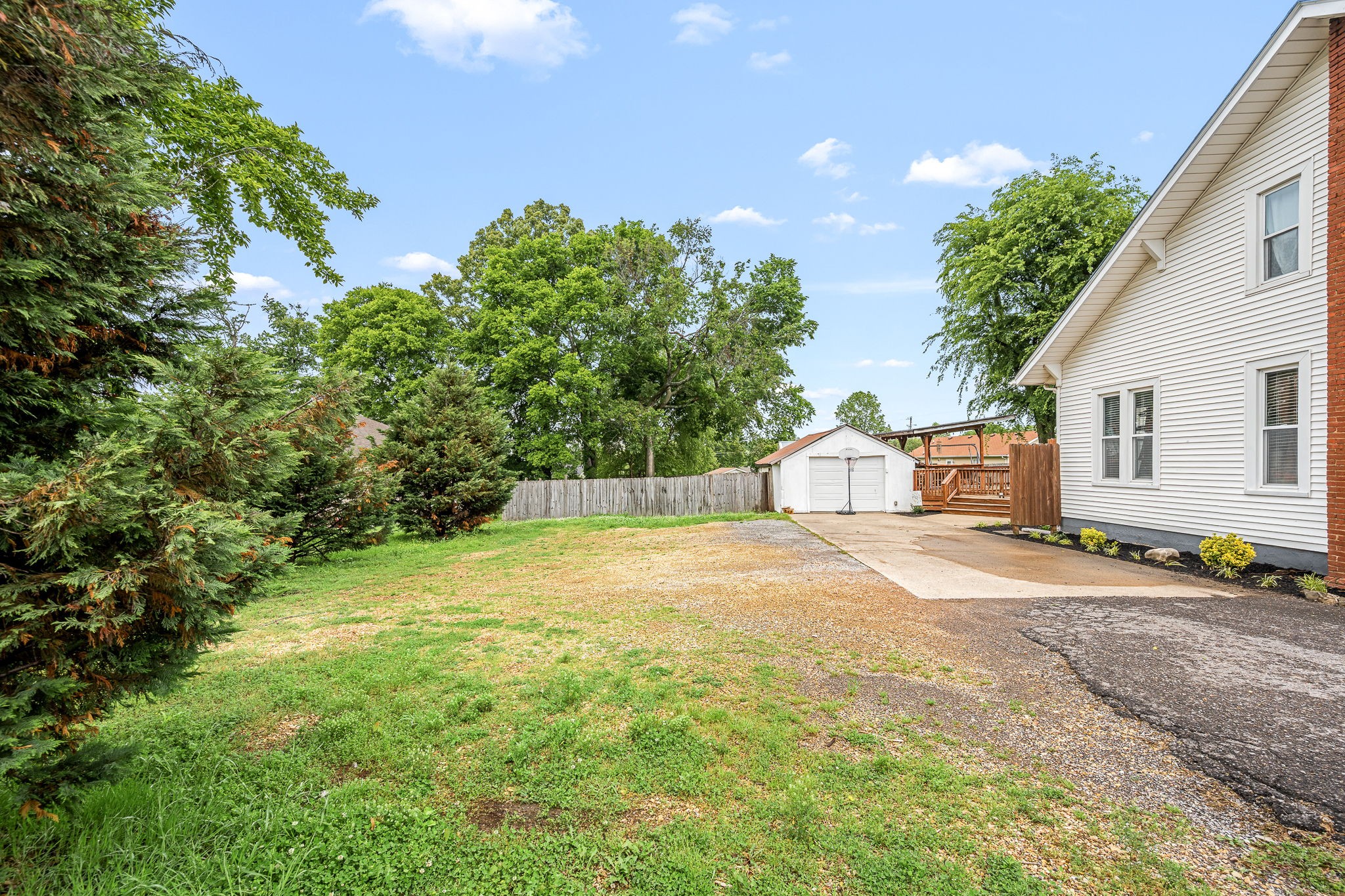 634 Highway 52 Portland, TN 37148 - Photo 34 of 42 a view of a house with a yard and garage