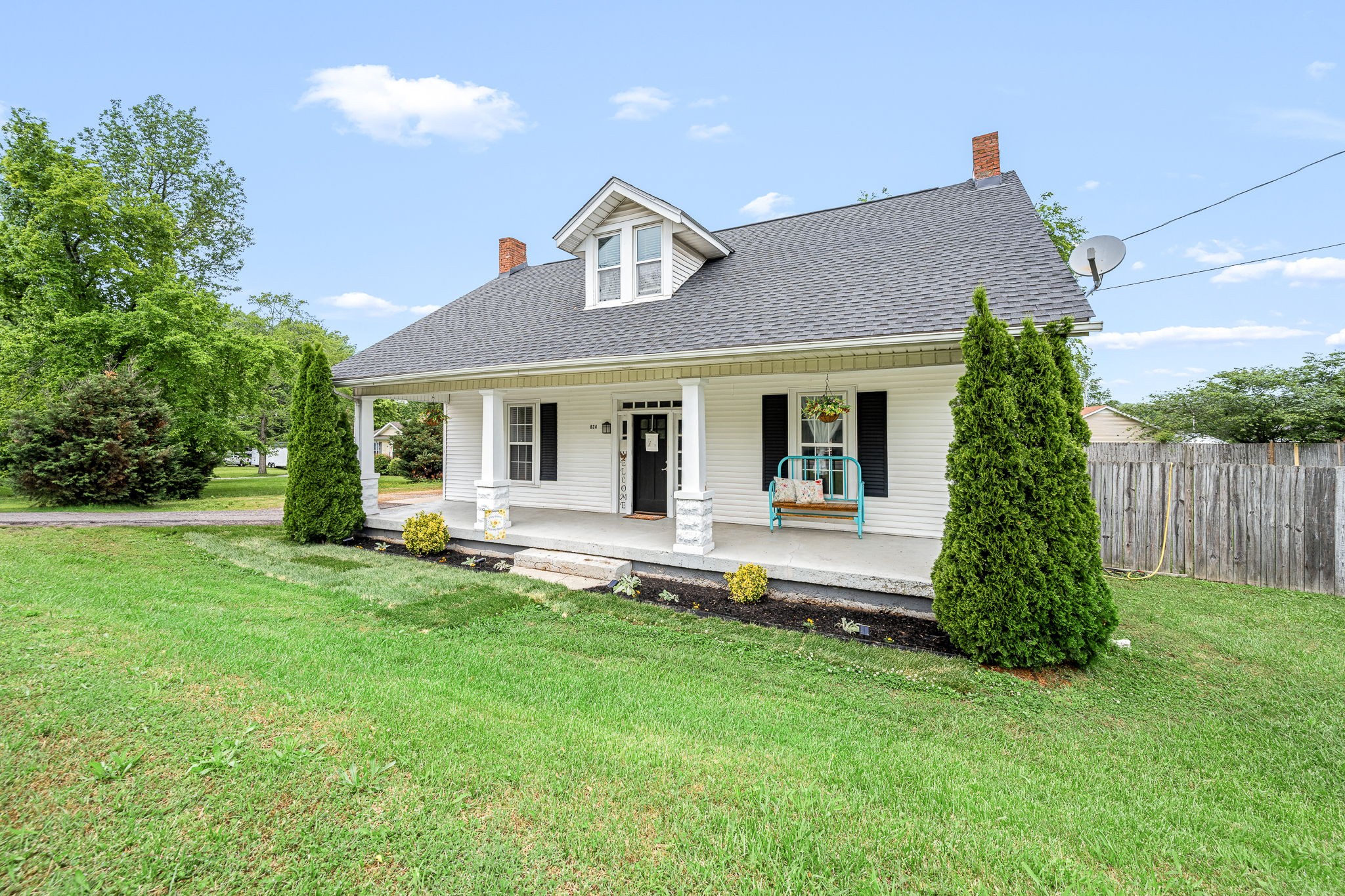 634 Highway 52 Portland, TN 37148 - Photo 42 of 42 a front view of a house with a garden