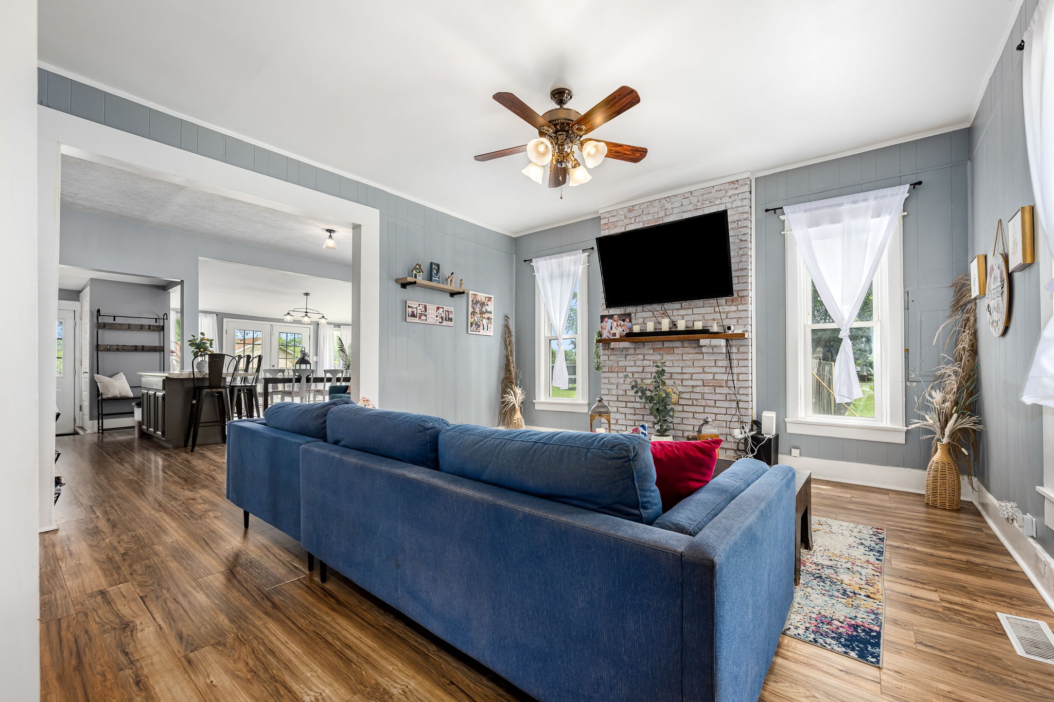 634 Highway 52 Portland, TN 37148 - Photo 9 of 42 a living room with furniture and a flat screen tv