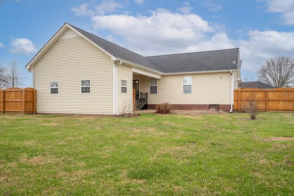 a view of backyard of house