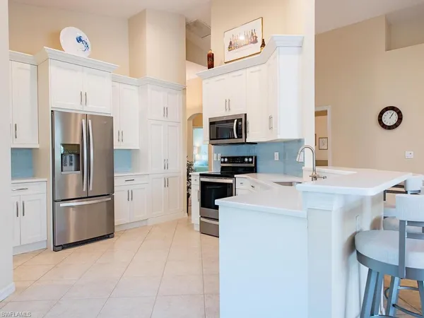 $575,000 | 64 Glen Eagle Circle, Naples, FL 34104