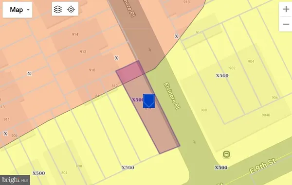 a view of backyard with seating space