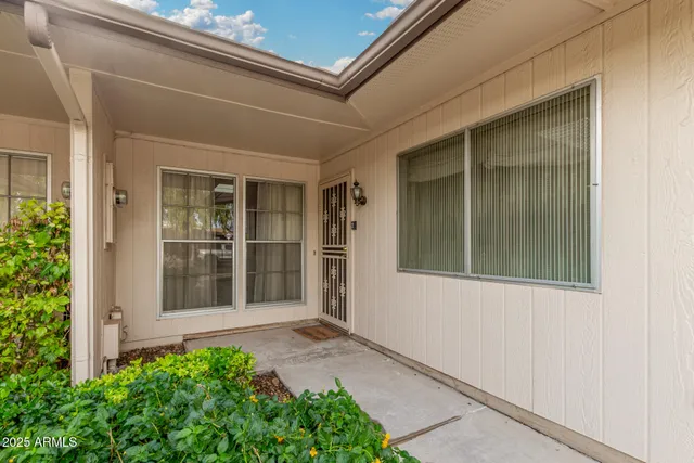 front view of a house with a small porch