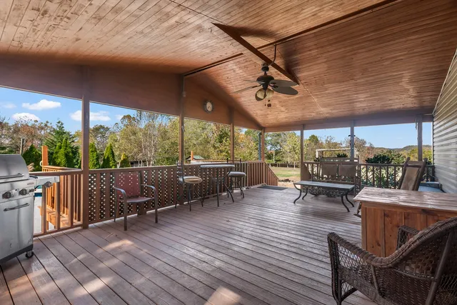 a view of a swimming pool with a patio