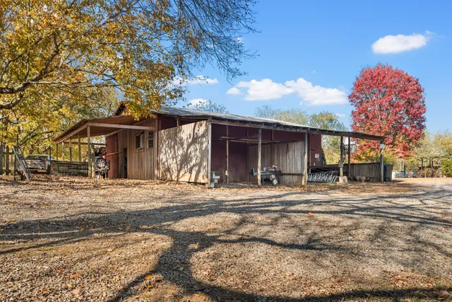 a view of a room with wooden walls