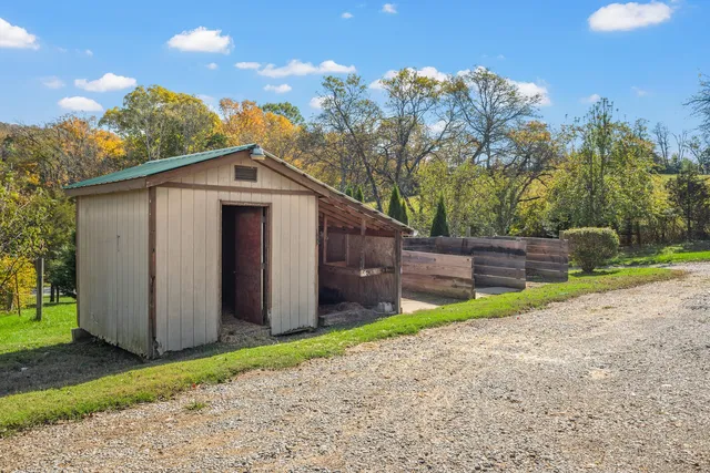 a backyard of a house with lots of green space