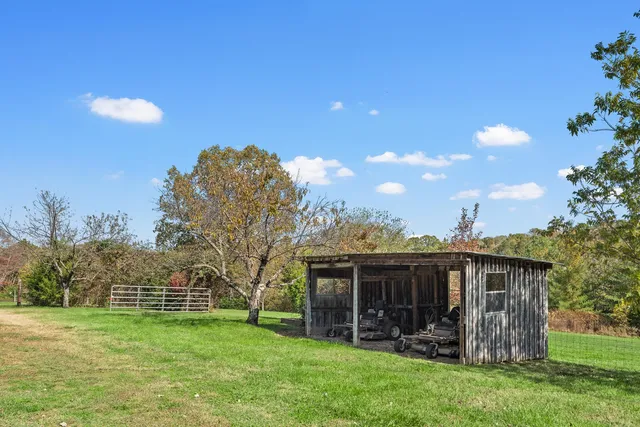 a view of a golf course with a lake