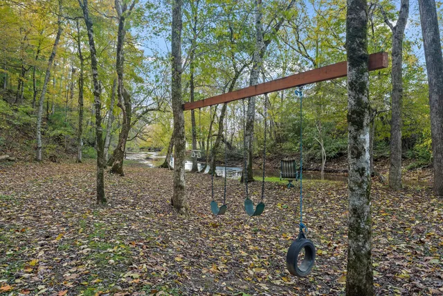 a view of sunset and a yard with sunset