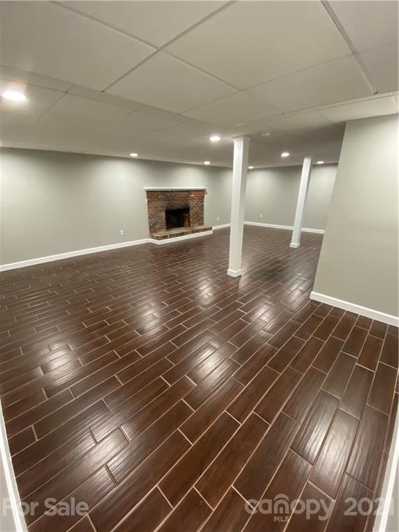 536 Fairview Road Marion, NC 28752 - Photo 15 of 34 a view of empty room with wooden floor