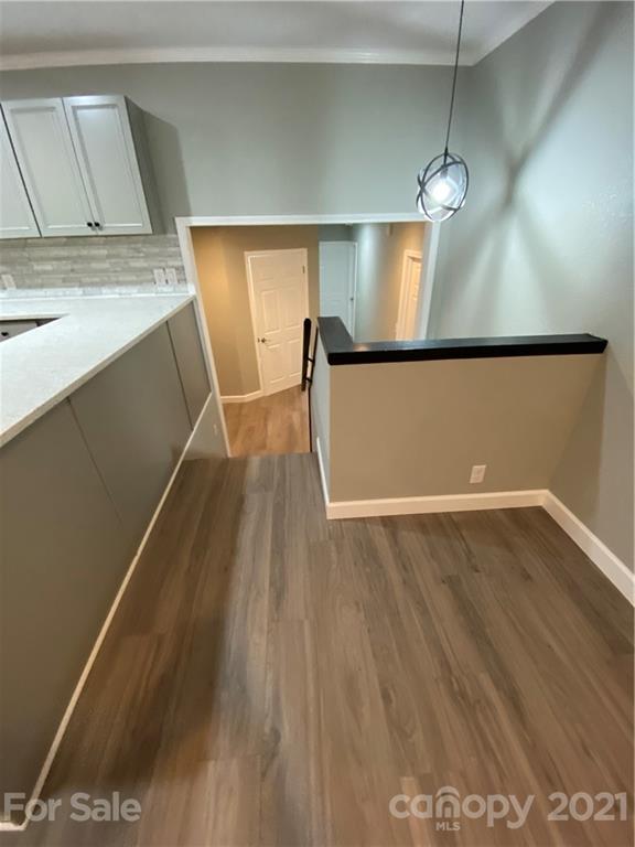 536 Fairview Road Marion, NC 28752 - Photo 20 of 34 a view of a room with a wooden floor