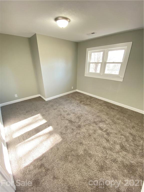 536 Fairview Road Marion, NC 28752 - Photo 23 of 34 an empty room with windows