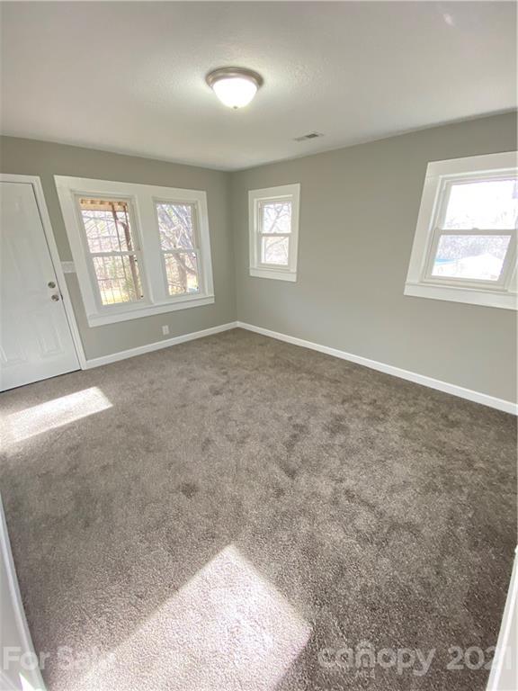536 Fairview Road Marion, NC 28752 - Photo 25 of 34 an empty room with windows