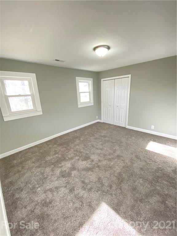 536 Fairview Road Marion, NC 28752 - Photo 26 of 34 a view of an empty room with a window