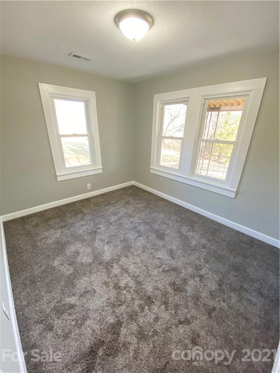 536 Fairview Road Marion, NC 28752 - Photo 27 of 34 a view of an empty room with a window