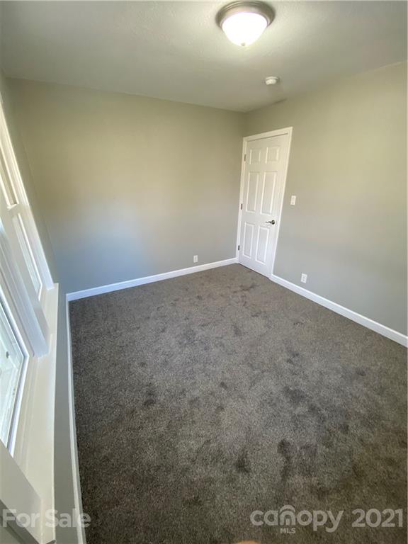 536 Fairview Road Marion, NC 28752 - Photo 28 of 34 an empty room with windows