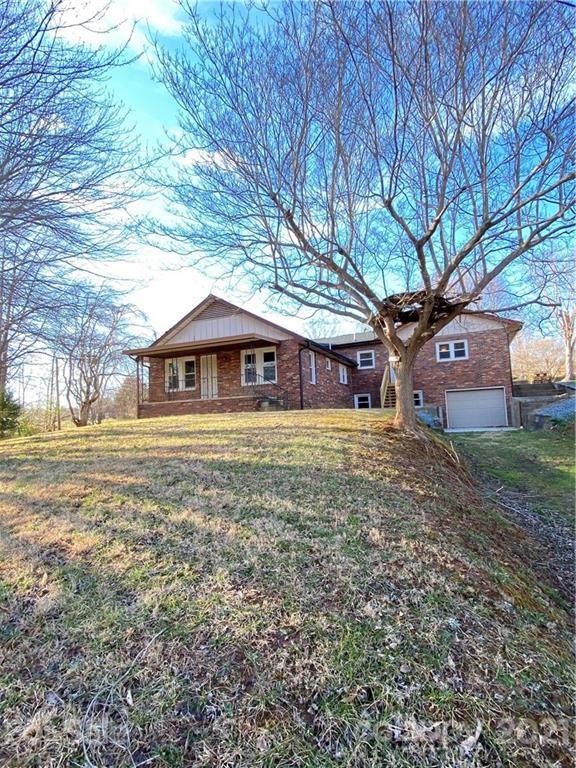 536 Fairview Road Marion, NC 28752 - Photo 29 of 34 a front view of a house with garden