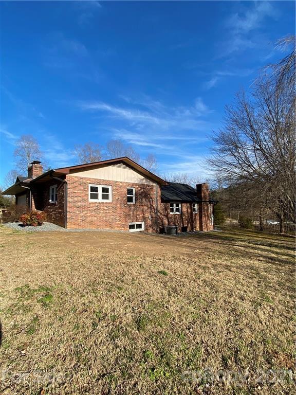 536 Fairview Road Marion, NC 28752 - Photo 30 of 34 a front view of a house with a yard