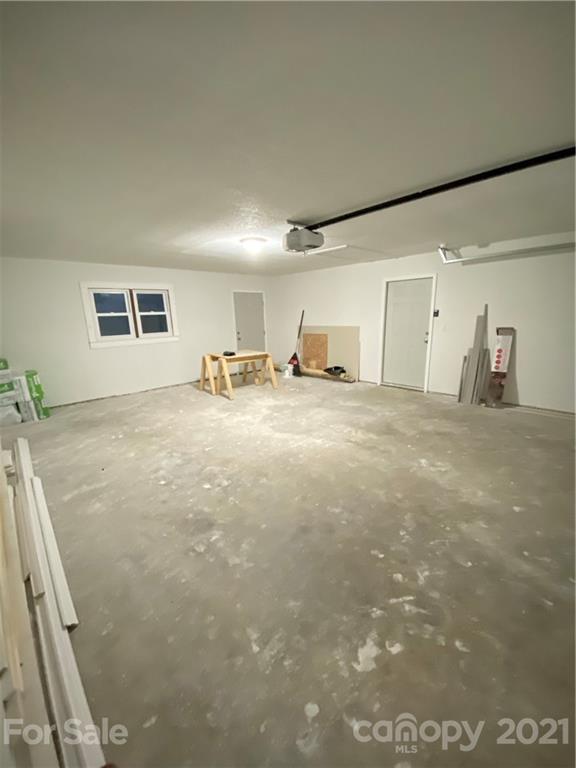 536 Fairview Road Marion, NC 28752 - Photo 32 of 34 a view of a room with two washing machine