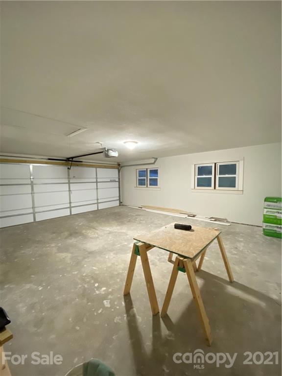 536 Fairview Road Marion, NC 28752 - Photo 33 of 34 a view of a hall with wooden floor