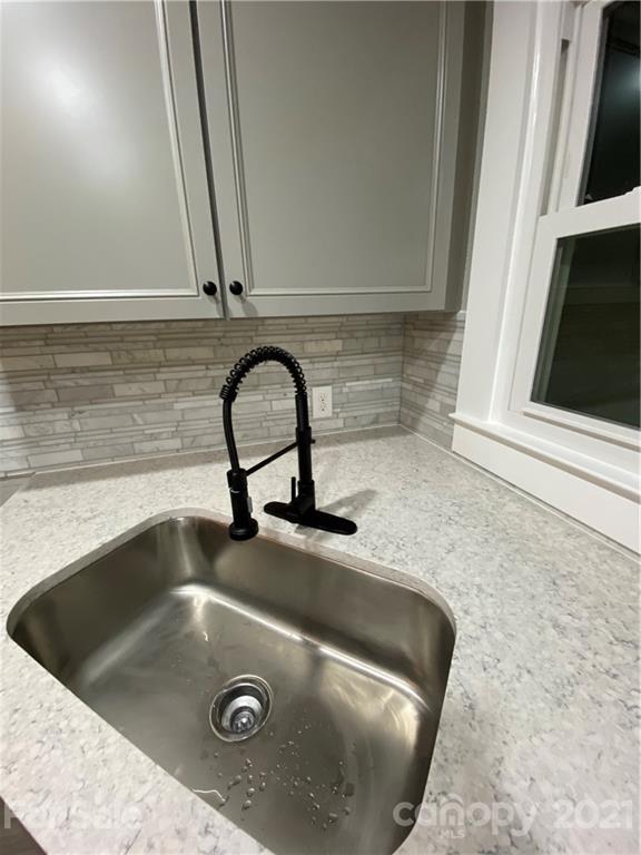 536 Fairview Road Marion, NC 28752 - Photo 6 of 34 a close view of sink and tap